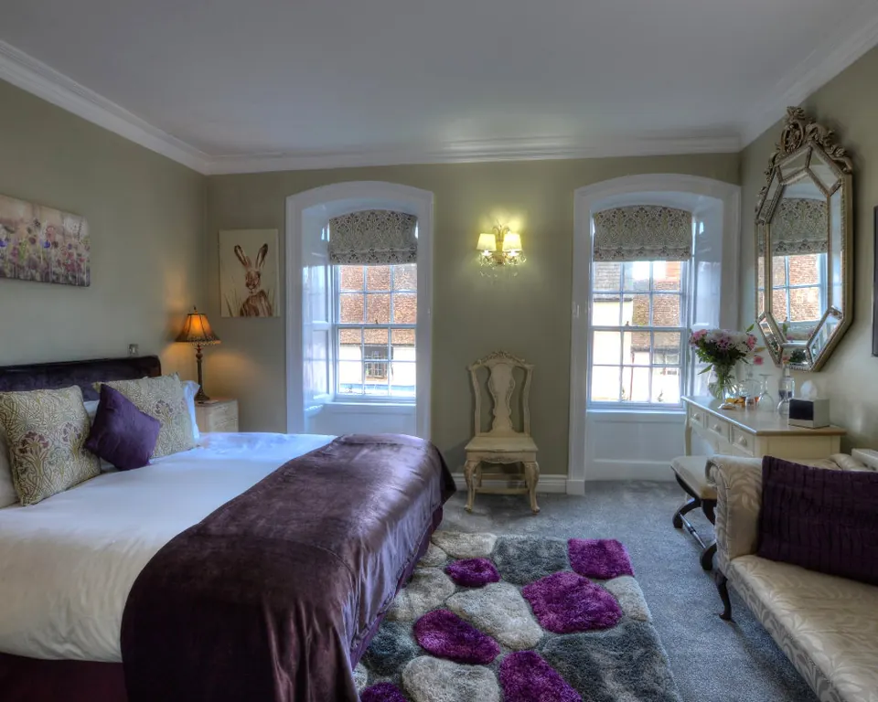 A double bedroom at Dunster Castle Hotel