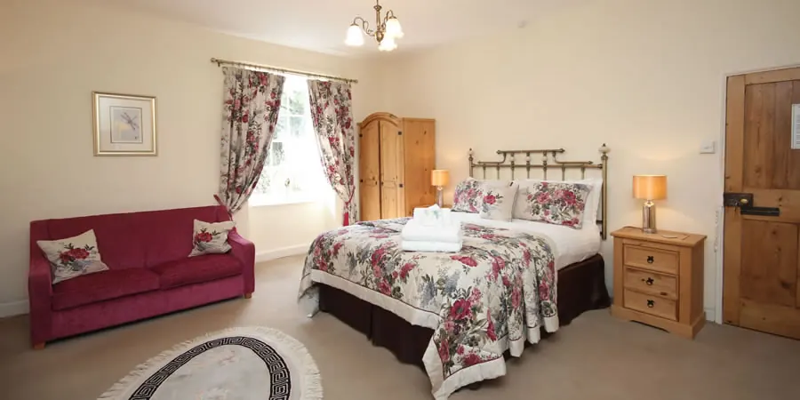 A bedroom at Dunster Mill House