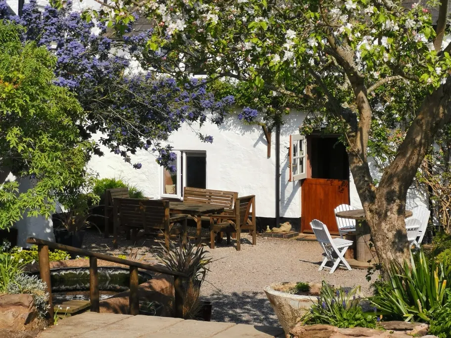 Steps Farmhouse courtyard and accommodation entrance